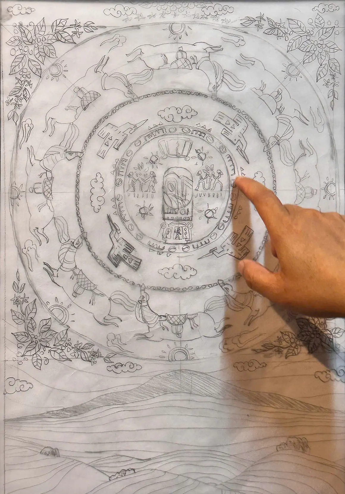 Pencil studies of the medallion and the hand-drawn ornament