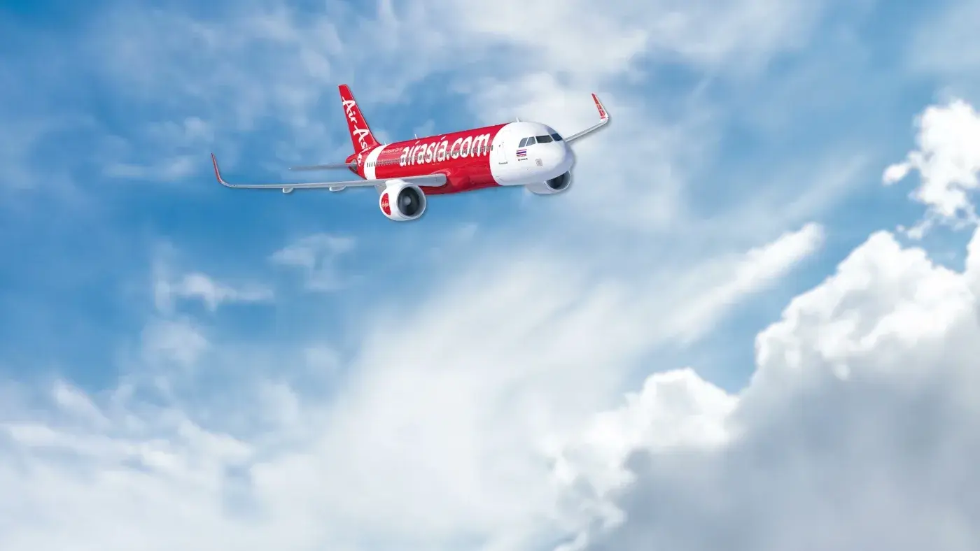 TVC frame — the aircraft climbing through cloud