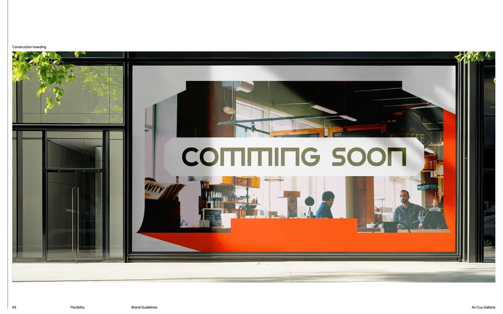 A COMMING SOON window graphic across the glazed shopfront