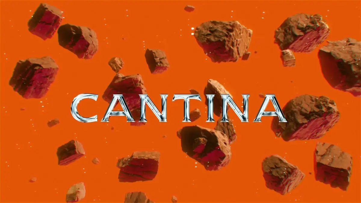 Film frame — the Cantina wordmark over an orange field scattered with rock