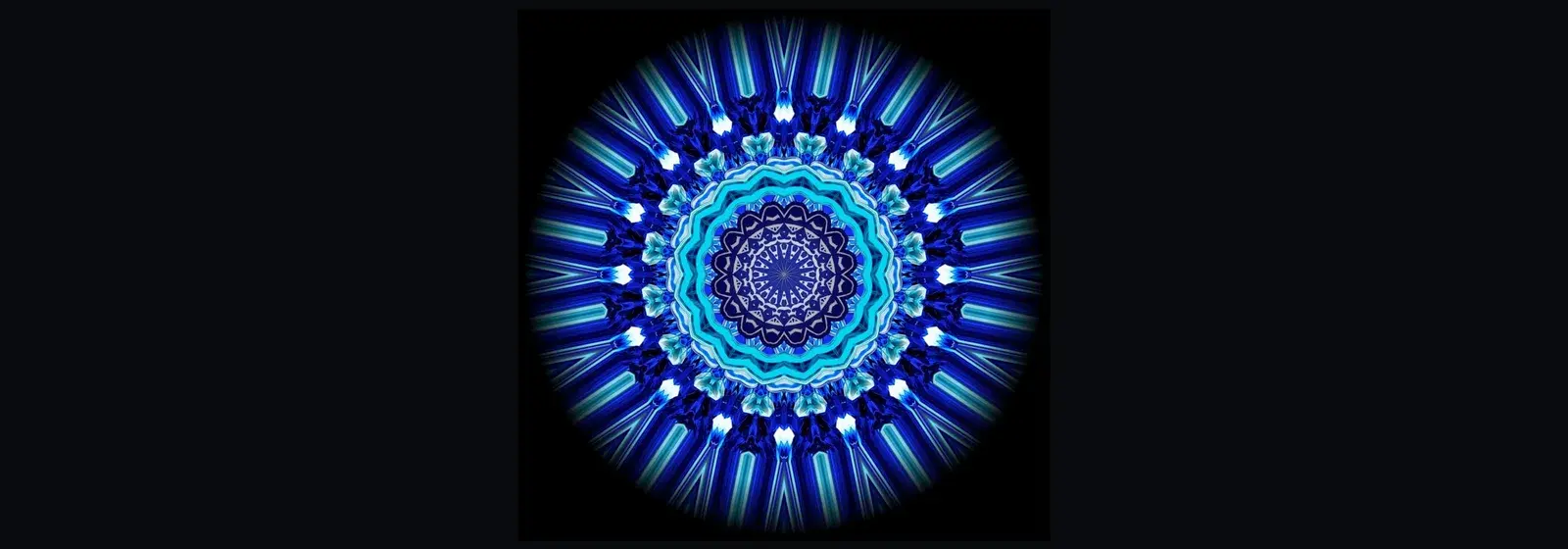 A blue kaleidoscope medallion glowing at the centre of a black band