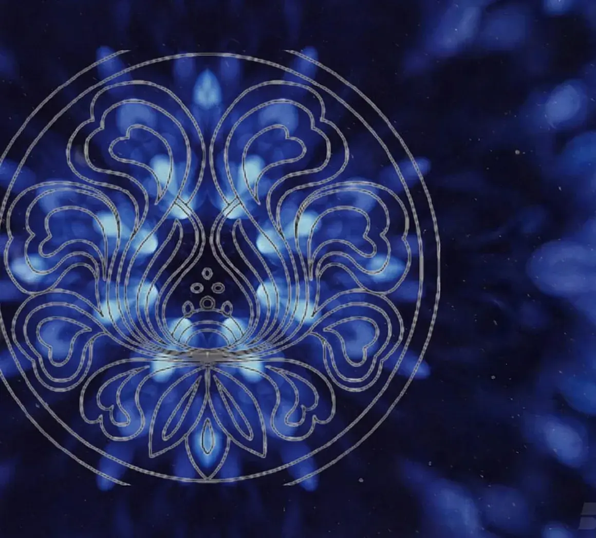 The same medallion rendered in light on the Blue Signature pack