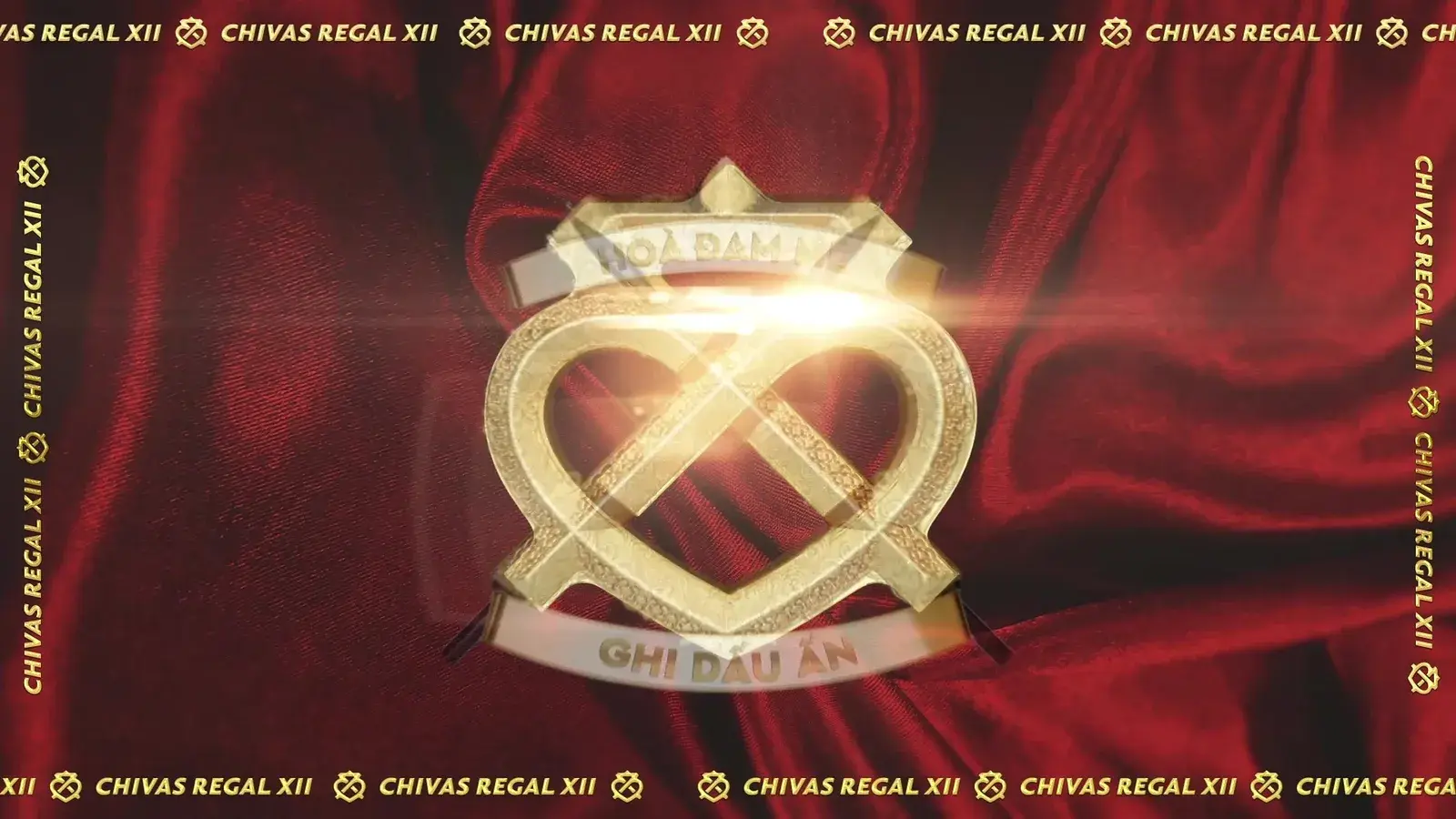 Film still — the Chivas Luckenbooth crest in gold on deep red velvet