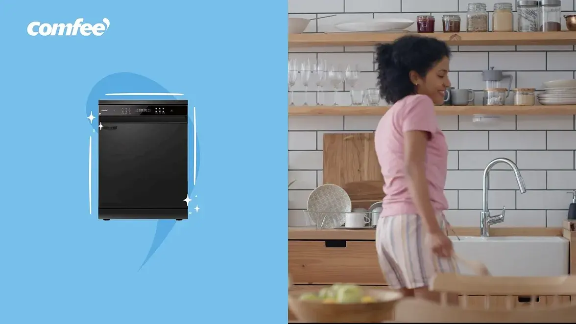 Dishwasher on blue beside a woman in a kitchen