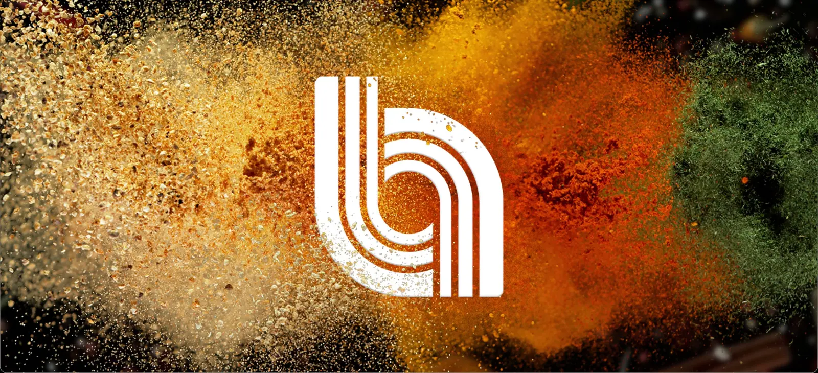 The mark rendered in ground spice — turmeric, paprika and pepper