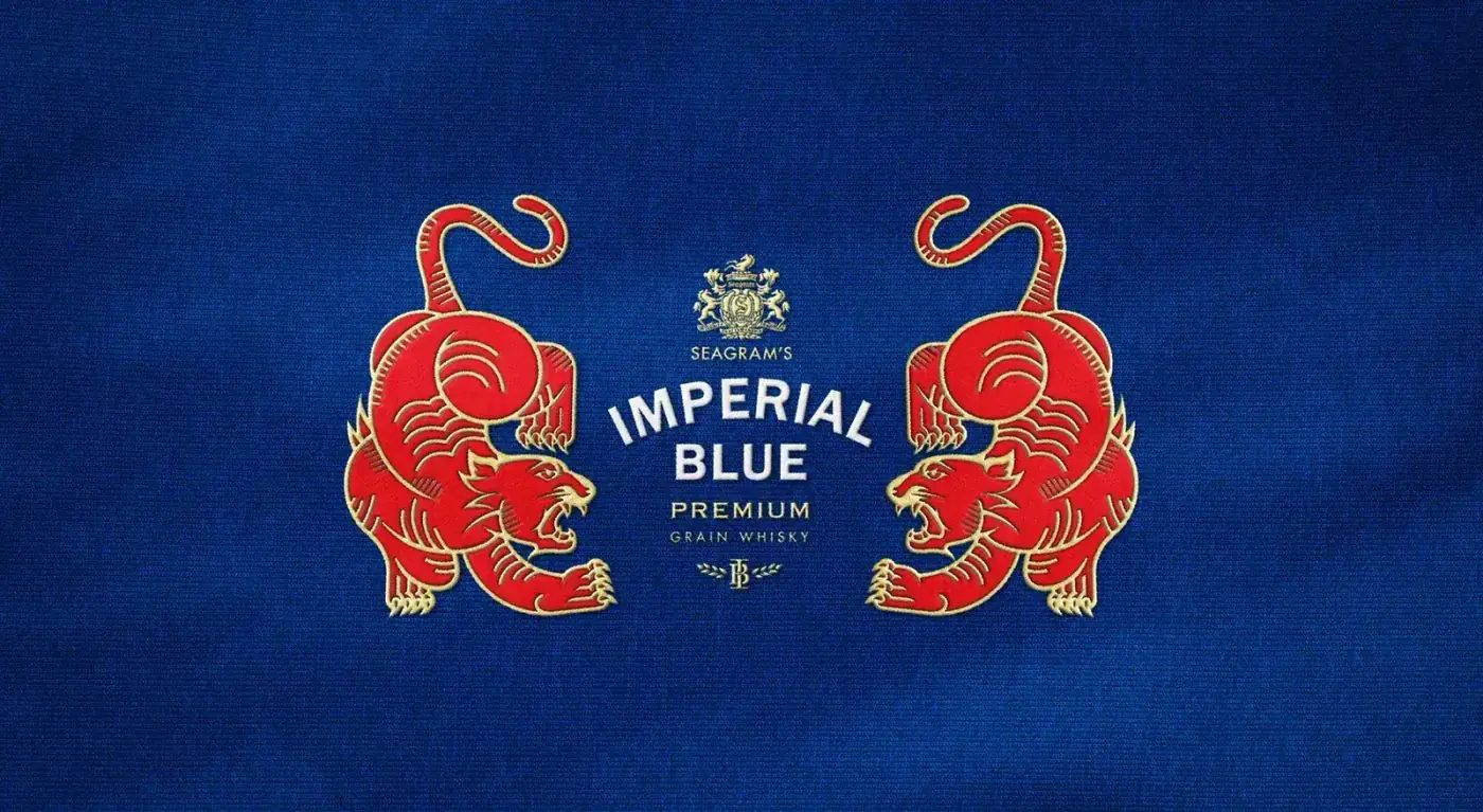 The lockup — two tigers facing each other around the Imperial Blue crest