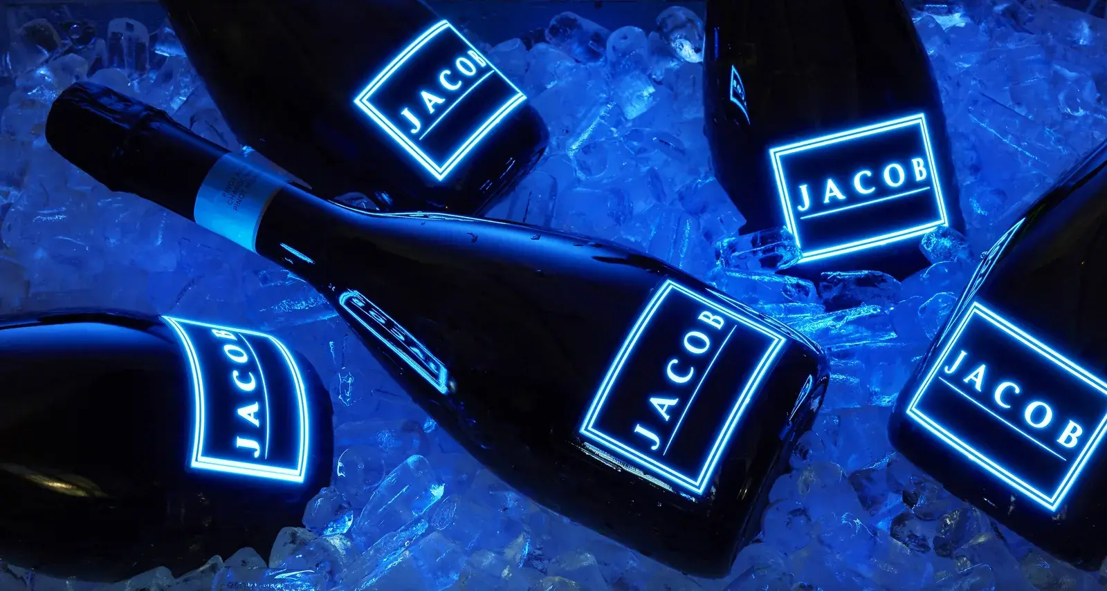 Three bottles standing in crushed ice