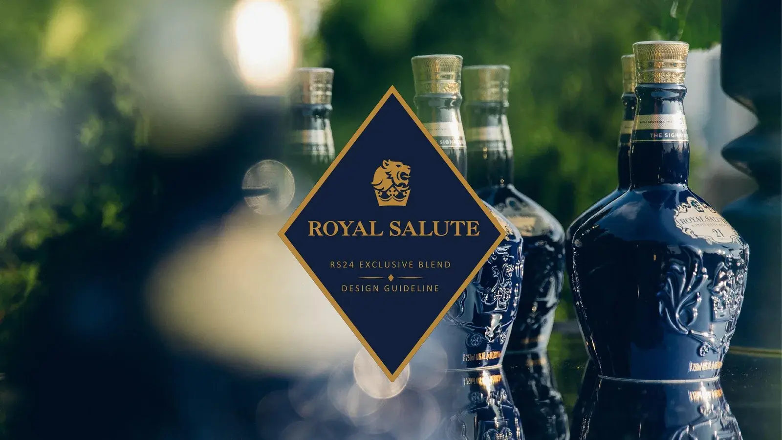 Two Royal Salute flagons outdoors under the crest of the 24 Year Old Exclusive Blend