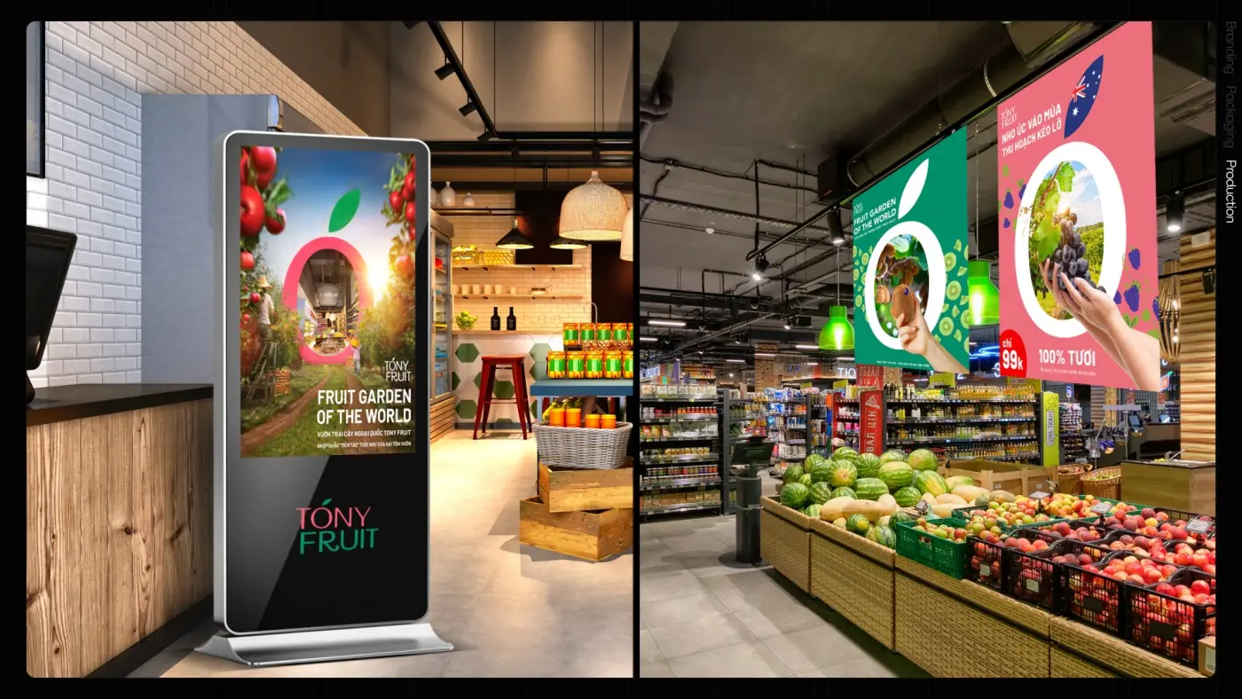 Digital screens in store carrying the key visual beside the fresh produce wall