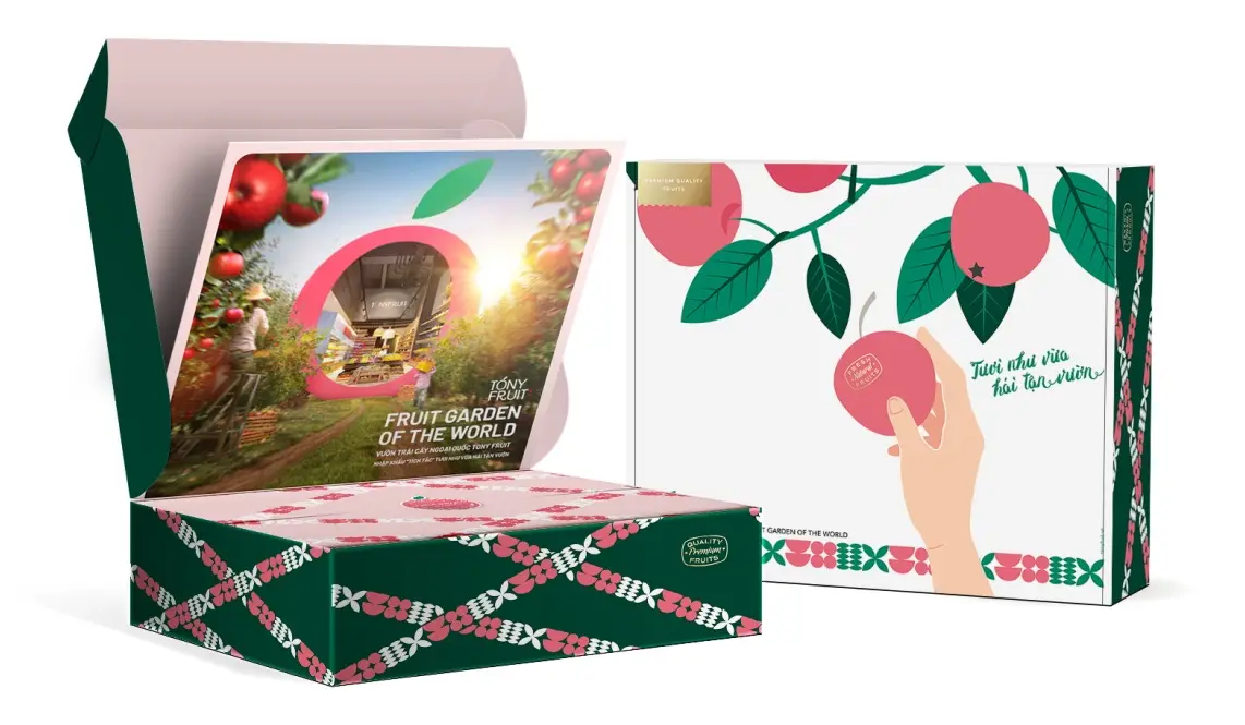 The gift box open, apples inside, lid and sleeve shown together